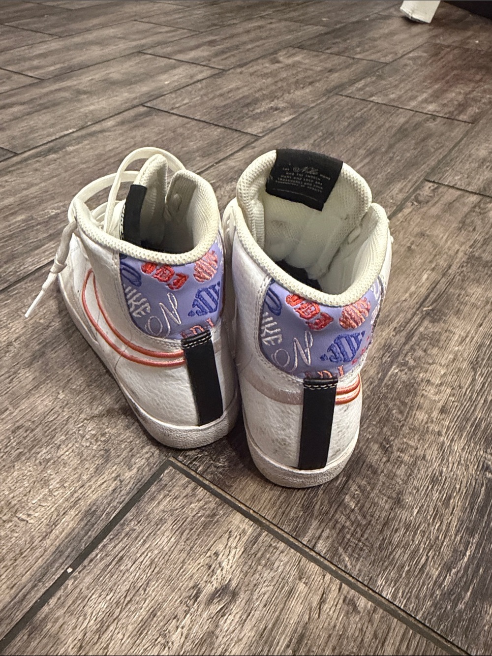 Nike Women’s High-Top Sneakers in White with Orange Swoosh - Picture 5 of 5